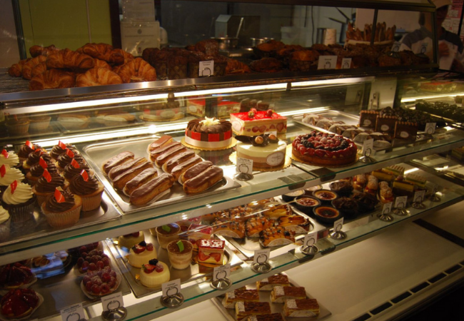 baked goods inside the glass stand