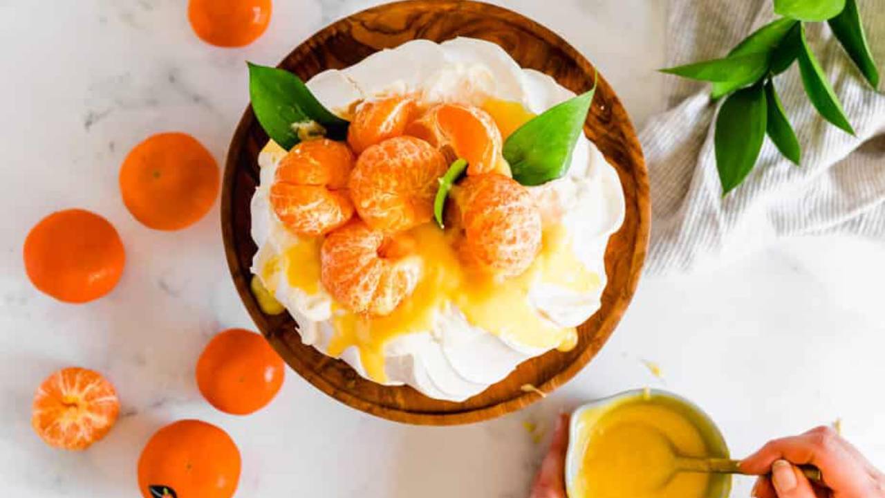 clementine curd pavlova on a table
