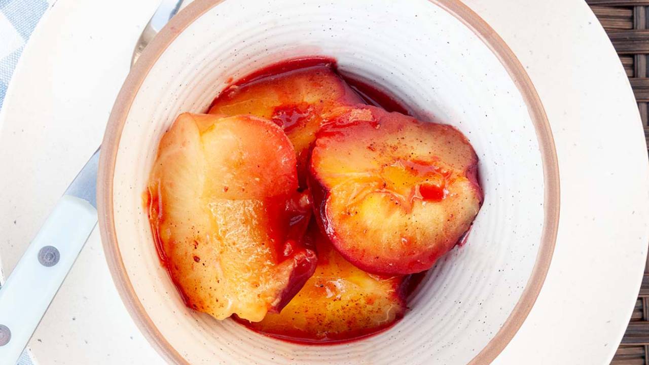 spiced grilled plums in a bowl
