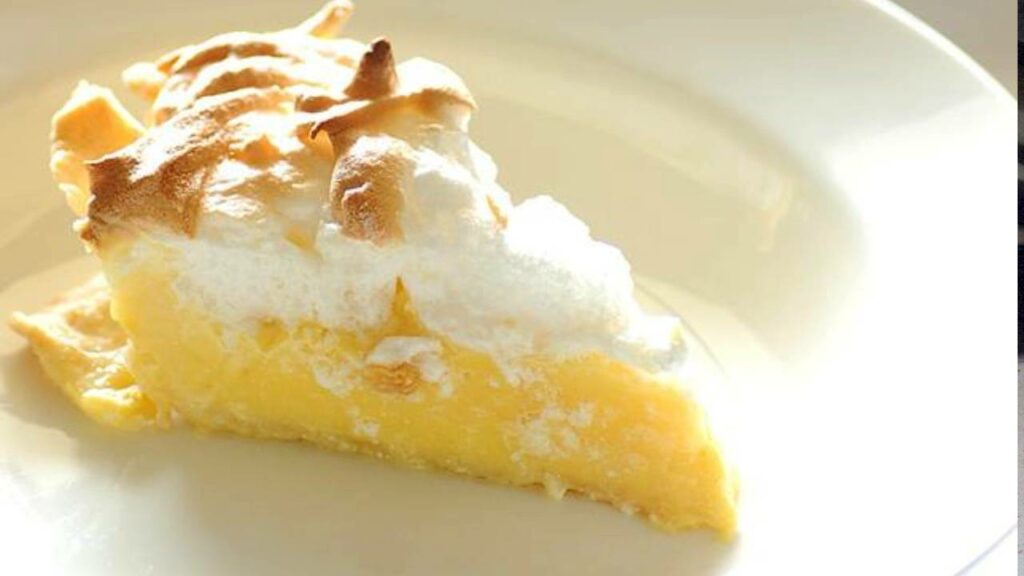 lemon meringue pie on white plate