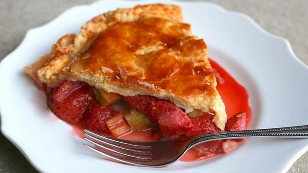 strawberry rhubarb pie on a plate