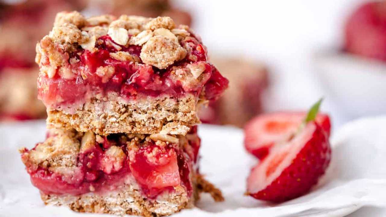 strawberry crumble squares on a plate