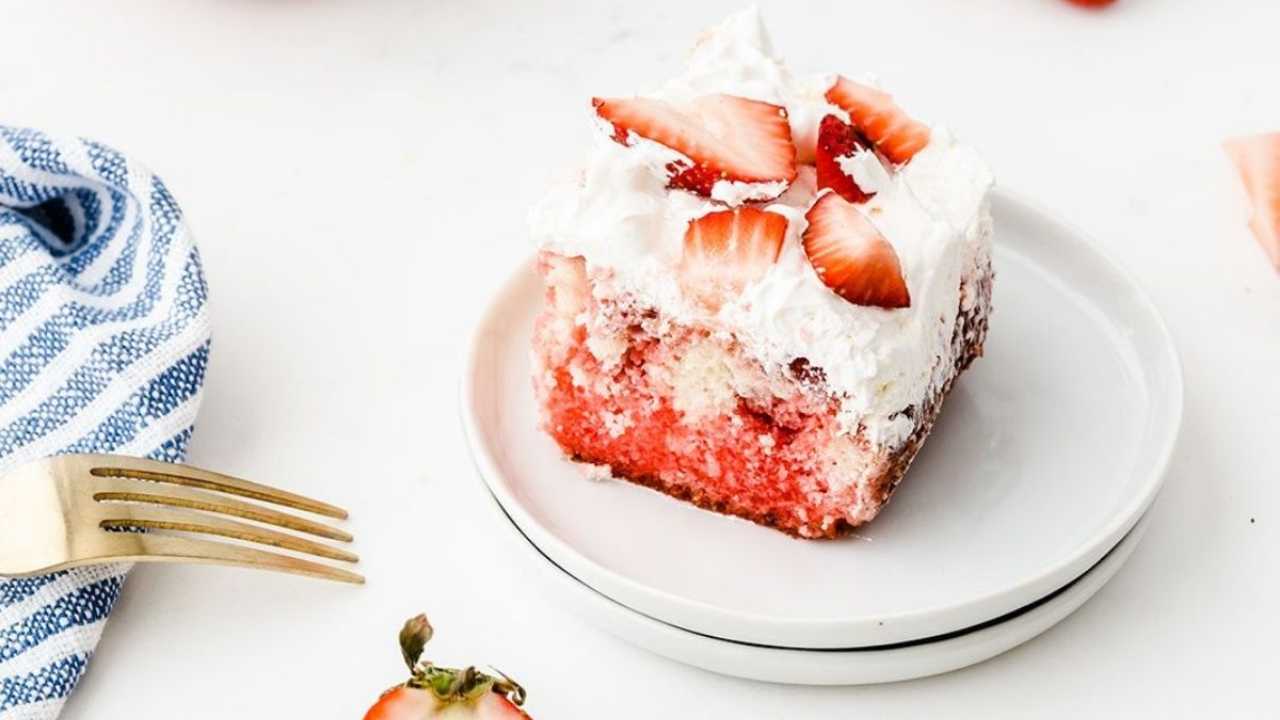strawberry poke cake on aplate